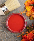 Dixie Belle Paint Barn Red Chalk Mineral Paint is the perfect paint for any DIY project! View of open container of Red chalk paint with a natural bristle brush which is the best brush for chalk paint.