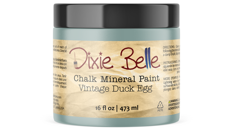 Jar of Dixie Belle Chalk Mineral Paint in Vintage Duck Egg color on a white background