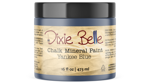Jar of Dixie Belle Chalk Mineral Paint in Yankee Blue color on a white background
