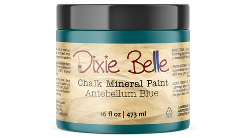 Jar of Dixie Belle Chalk Mineral Paint in Antebellum Blue on a white background