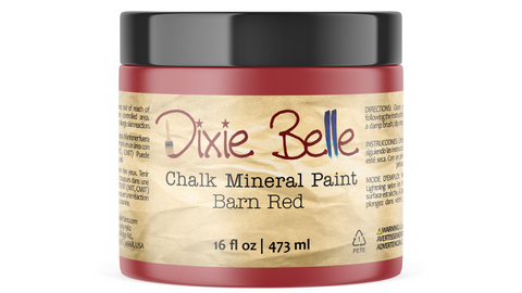 Jar of Dixie Belle Chalk Mineral Paint in Barn Red on a white background