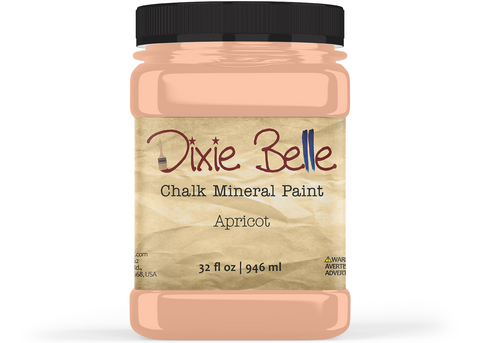Jar of Dixie Belle Chalk Mineral Paint in Apricot color on a white background