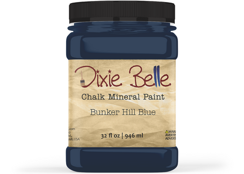 Jar of Dixie Belle Chalk Mineral Paint in Bunker Hill Blue color on a white background