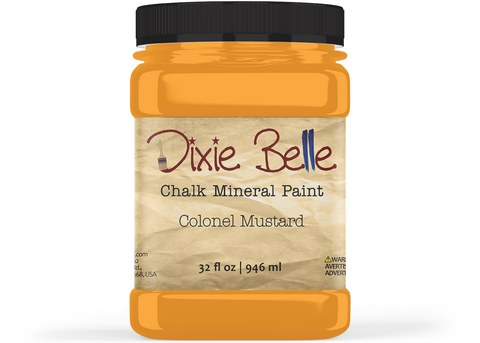 Jar of Dixie Belle Chalk Mineral Paint in Colonel Mustard color on a white background