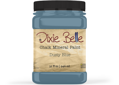 Jar of Dixie Belle Chalk Mineral Paint in Dusty Blue color on a white background