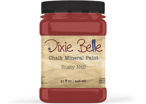 Jar of Dixie Belle Chalk Mineral Paint in Rusty Nail color on a white background
