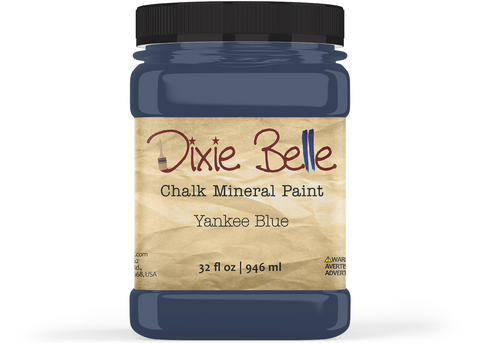 Jar of Dixie Belle Chalk Mineral Paint in Yankee Blue color on a white background