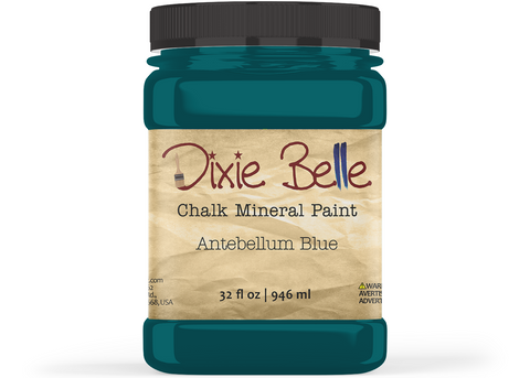 Jar of Dixie Belle Chalk Mineral Paint in Antebellum Blue on a white background