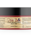 Jar of Dixie Belle Chalk Mineral Paint in Barn Red on a white background