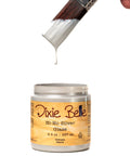 Dixie Belle Hi-Ho Silver Glaze with a brush dipping into it on a white background