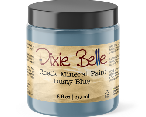 Jar of Dixie Belle Chalk Mineral Paint in Dusty Blue color on a white background