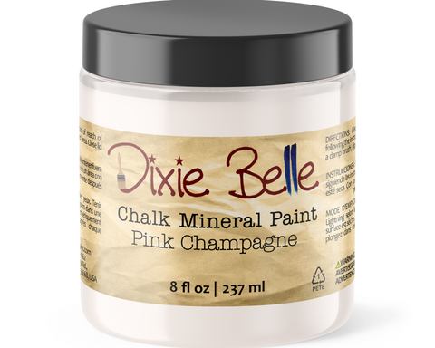 Jar of Dixie Belle Chalk Mineral Paint in Pink Champagne color on a white background