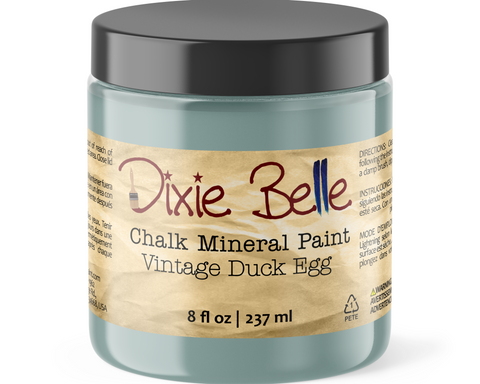 Jar of Dixie Belle Chalk Mineral Paint in Vintage Duck Egg color on a white background