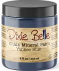 Jar of Dixie Belle Chalk Mineral Paint in Yankee Blue color on a white background
