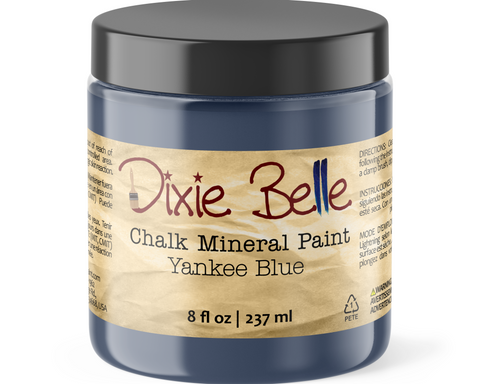 Jar of Dixie Belle Chalk Mineral Paint in Yankee Blue color on a white background