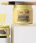 Jars of 'Moonshine Metallics Wedding Belle' paint by Dixie Belle on a white background