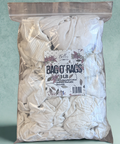 Bag of white rags with a label on a light green background