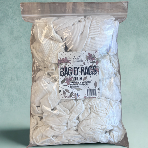 Bag of white rags with a label on a light green background