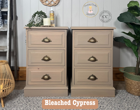 Two wooden nightstands with brass handles in a room setting, featuring the brand 'Cherubs Chalks Interiors'.