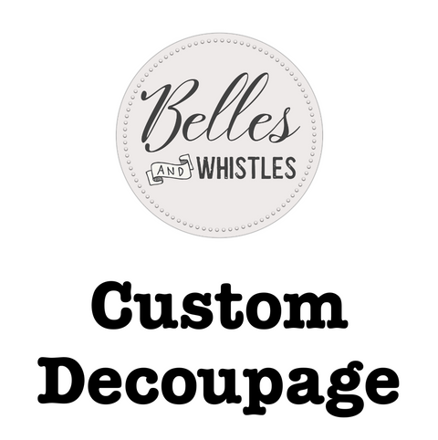 Round white logo with 'Belles and Whistles' branding and text 'Custom Decoupage' below.