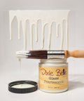 Jar of Dixie Belle Glaze Pearlescent with a brush and white background
