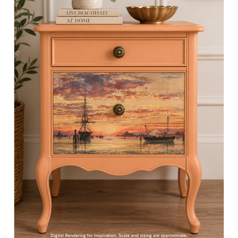 A peachy orange-colored nightstand with two drawers, featuring a detailed nautical sunset decoupage on the front of the lower drawer. The nightstand has cabriole legs, brass-style knobs, and is styled in a home interior setting with a plant and books. Label reads "Digital Rendering for Inspiration. Scale and sizing are approximate."