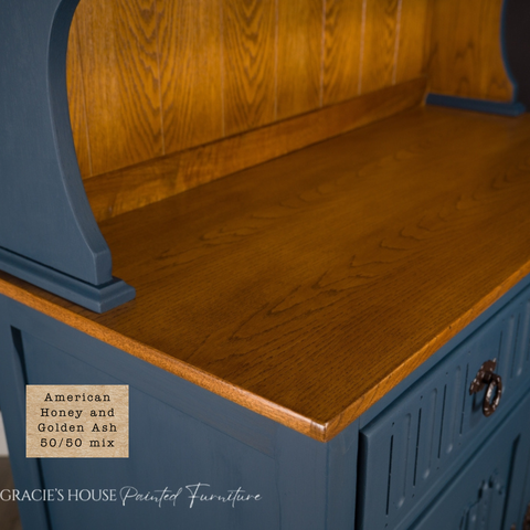 Wooden furniture with blue painted sides and a wooden top, featuring 'Gracie's House Painted Furniture' branding.
