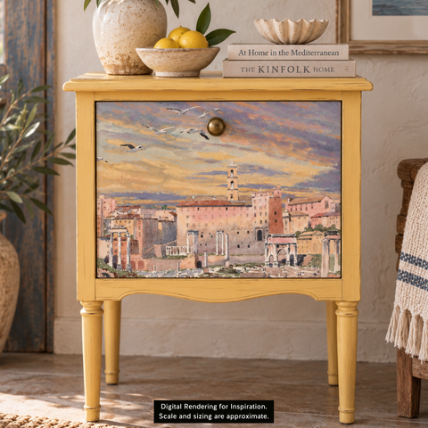 A yellow-painted wooden nightstand with a scenic Mediterranean cityscape decoupage on the front door, styled in a home interior setting. Label reads "Digital Rendering for Inspiration. Scale and sizing are approximate."