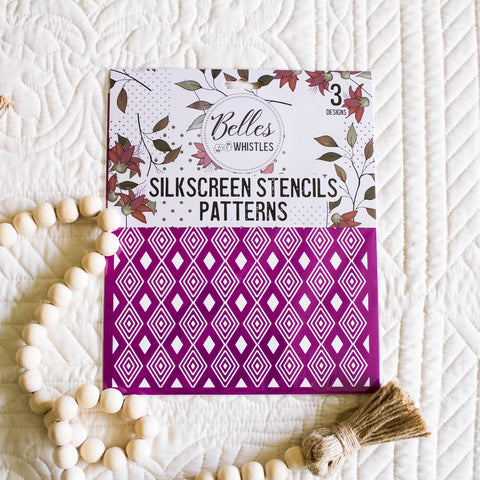 Silkscreen stencils patterns with decorative elements on a textured surface