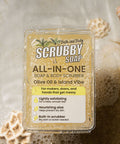 Scrubby Soap on a textured background with sand and shells