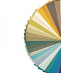 Color swatch wheel with various shades of green, blue, and brown on a white background
