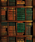 A dense arrangement of vintage hardcover books with green and brown leather-bound spines, organized on dark wooden bookshelves.