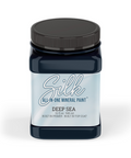 A 32 oz. jar of Silk All-In-One Mineral Paint in the color Deep Sea, featuring a dark blue body, a black lid, and a light blue and white label.