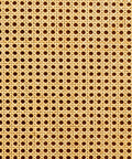 Close-up of a woven cane chair seat with a hexagonal pattern. The natural beige material forms a symmetrical, openwork design, creating a textured and airy appearance.