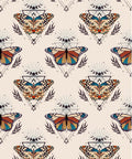 Patterned image featuring ornate butterflies with geometric and celestial designs. Displays a repeating motif.