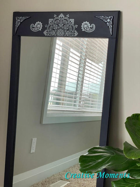 Belles and Whistles Mandala - Silkscreen Stencil provides an extra decorative touch to any project! Black Painted Mirror with Chalk Painted White Mandala Stencil on the border.