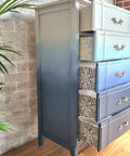 Belles and Whistles Morocco - Stencil provides an extra decorative touch to any project! Ombre Blue Chalk painted dresser with white painted morocco stencil painted on the side of the drawers.