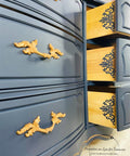 Belles and Whistles Mosaic - Silkscreen Stencil provides an extra decorative touch to any project! Navy Blue Dresser with Belles and Whistles Mosaic Silkscreen Stencil on the inside of the drawers.