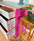 Belles and Whistles Native Rose - A1 Rice Decoupage Paper is a simple way to visually enhance any surface of your project! Bright pink dresser with decoupage on the inside of the drawers. Staged next to a potted plant.