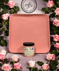 Wooden tray painted with Cottage Door Chalk Mineral Paint. Staged with roses surrounding the wooden tray and paint jar.