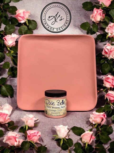 Wooden tray painted with Cottage Door Chalk Mineral Paint. Staged with roses surrounding the wooden tray and paint jar.
