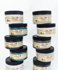 Dixie Belle Paint 4 oz All 64 Colors - Package - Various 4oz Dixie Belle Chalk Mineral Paints stacked against a white background.