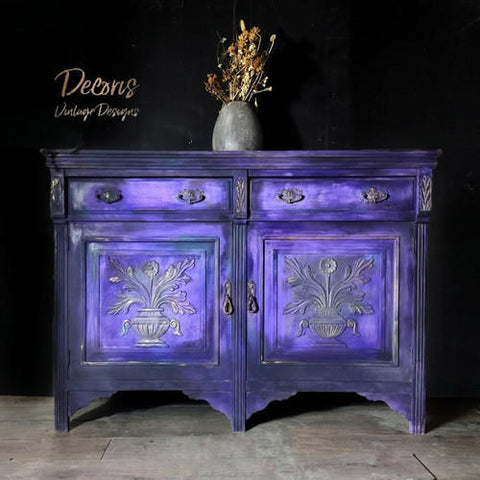 Dixie Belle Paint Amethyst Chalk Mineral Paint is the perfect paint for any DIY project! Beautiful cabinet painted with our deep purple Amethyst Chalk Mineral Paint staged with vase and dried flowers.