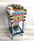 Dixie Belle Paint Blueberry Chalk Mineral Paint is the perfect paint for any DIY project!
Abstract color/pattern end table with the legs painted in Blueberry Chalk Mineral Paint.