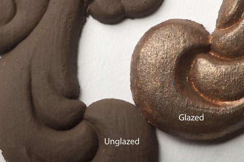 Dixie Belle Paint Copper Bronze Glaze 
This shows two appliques painted brown.  One is unglazed and one is glazed in the Copper Bronze Glaze.  The pieces have Unglazed and Glazed over the appropriate applique.
