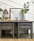 Dixie Belle Paint Hurricane Gray Chalk Mineral Paint is the perfect paint for any DIY project!
Two nightside table painted in  Hurricane Gray Chalk Mineral Paint staged with various vases, greenery, and a white picture of a long haired bull on top of the tables.