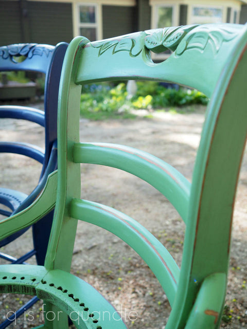 Dixie Belle Paint Kudzu Chalk Mineral Paint is the perfect paint for any DIY project!
An image of a wooden chair close up on the back support painted in Kudzu Chalk Mineral Paint.
