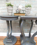 Dixie Belle Paint Mason Dixon Gray Chalk Mineral Paint is the perfect paint for any DIY project! Dark Gray Chalk painted End tables with Yellow Stencils painted all over. Staged with two potted plants a bird and a book on top.