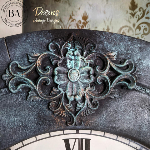 Dixie Belle Paint Patina Spray. Floral Décor on clock made to look rusty with Patina Spray and Paint.