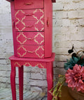 Dixie Belle Paint Peony Chalk Mineral Paint is the perfect paint for any DIY project! Pink chalk painted jewelry stand with gold patterns painted on the front